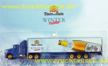 Thurn und Taxis Winter Festbier (2001), mit schräger Flasche vor verschneiten Bäumen